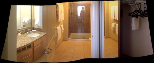 Another panorama: Separate, outside sink at left; bathroom (shower but alas, no tub) in the middle; closet on the right.