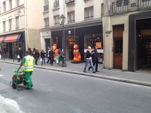 The big orange statues are outside now, perhaps to free up more space inside (the shop is packed with gear and shoppers)