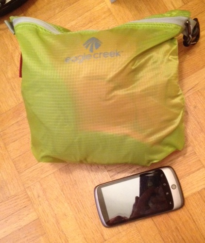 The stuffed Eagle Creek sack, with a random phone for scale