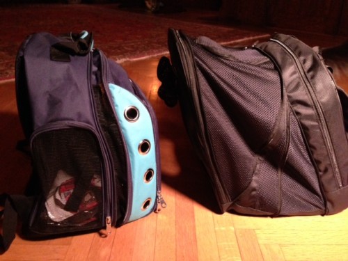 Please note that the pet compartment for the Canine Casual (on the left) includes the area behind the powder-blue, grommeted panel; the pet compartment for the Pet At Work (on the right) ends just to the right of the 
