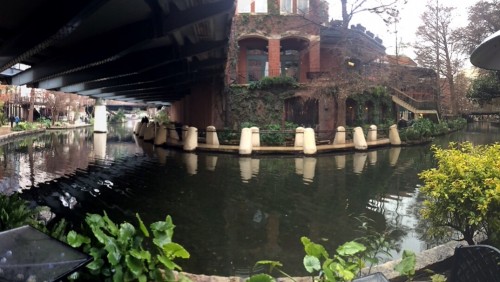 I failed to take a picture of our Drury hotel room in San Antonio, but you can walk directly out of it onto the beautiful Riverwalk, shown here in one of my beloved panoramas — pets welcome to amble alongside you, and Chloe had a blast