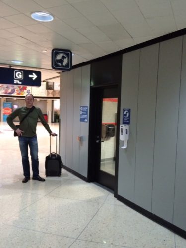 A better view of the door to the pet relief area, with my husband looking triumphant. And a little sweaty.